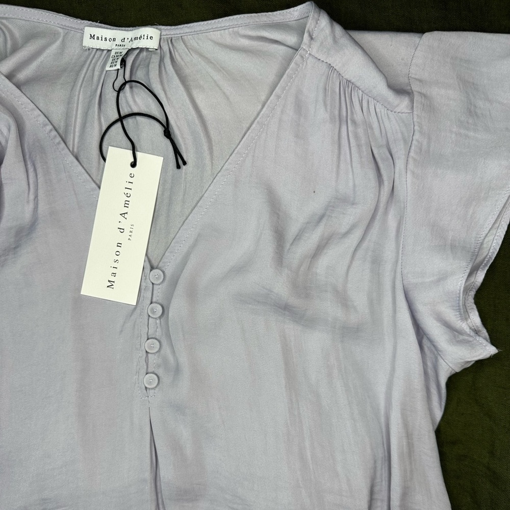 New with tags women’s medium blouse.